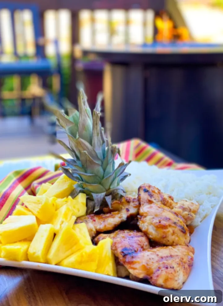 Ultimate Grilled Teriyaki Chicken 5 Ingredients for homemade Hawaiian teriyaki sauce laid out on a wooden cutting board.