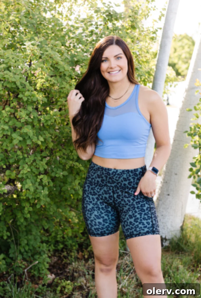 KIAVA Must-Haves 5 Woman in KIAVA sports bra, demonstrating flexibility and comfort.