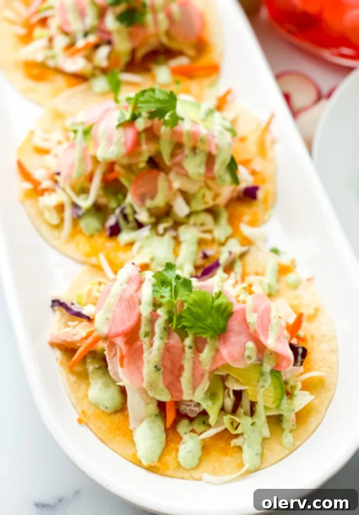 Zesty Salmon Tacos 4 A seasoned salmon fillet on aluminum foil, prepared for grilling.
