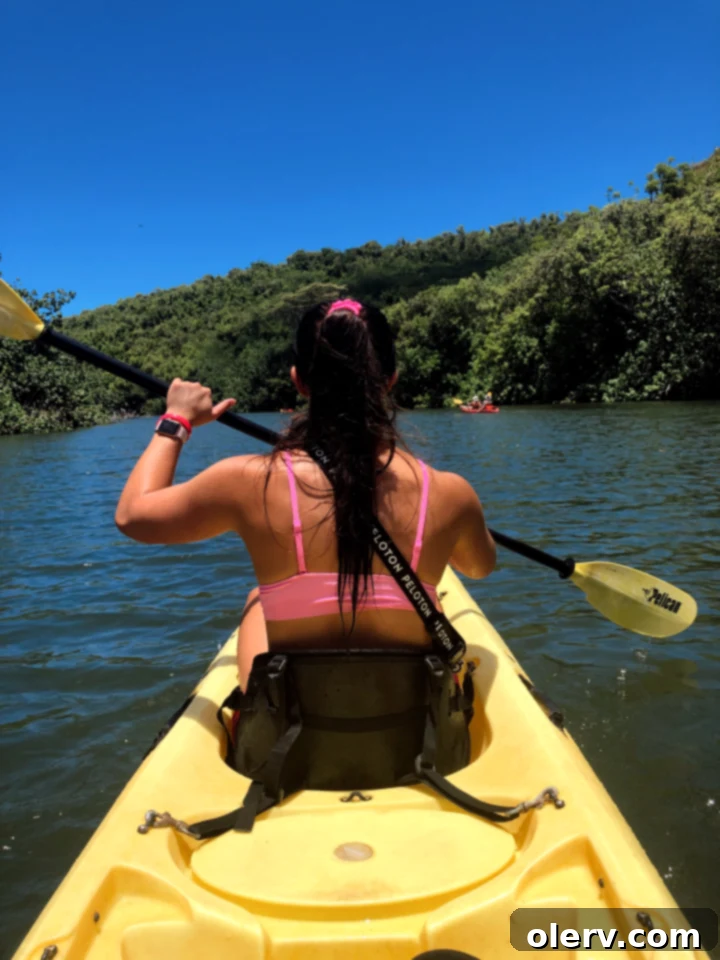 Kauai Revealed: Your Essential Hawaii Travel Companion 10 People enjoying Queen's Bath tide pools