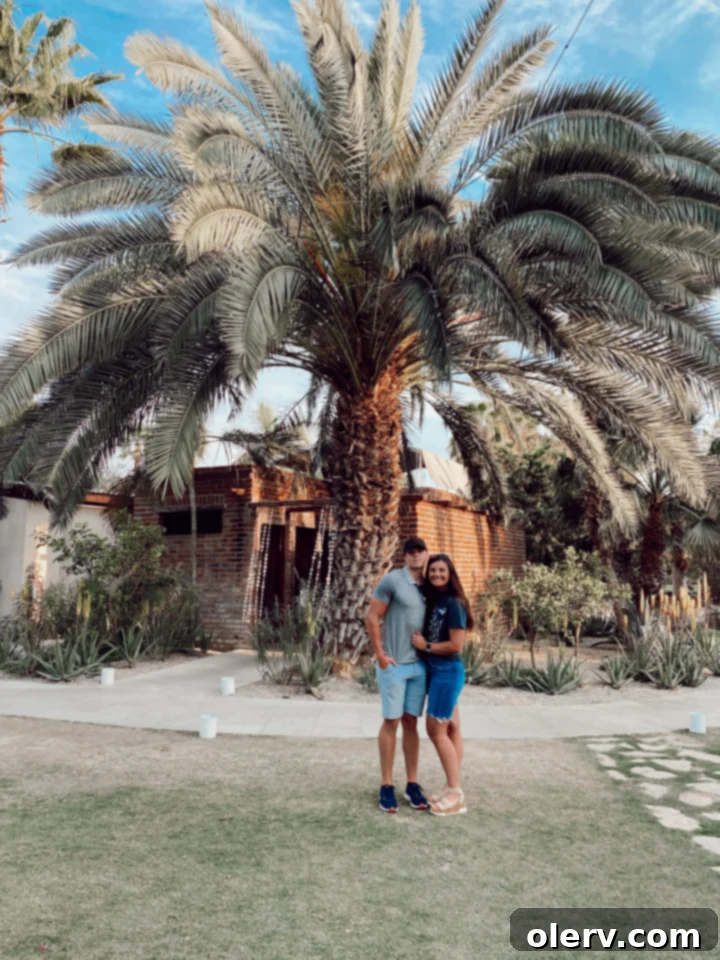 Unlock Cabo San Lucas Your Essential Guide to an Epic Escape 6 People enjoying food and drinks at a lively beachside restaurant with colorful decor in Cabo San Lucas.
