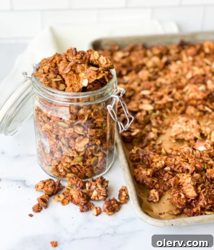 Maple Almond Delight 6 Finished maple almond granola cooling on a baking sheet