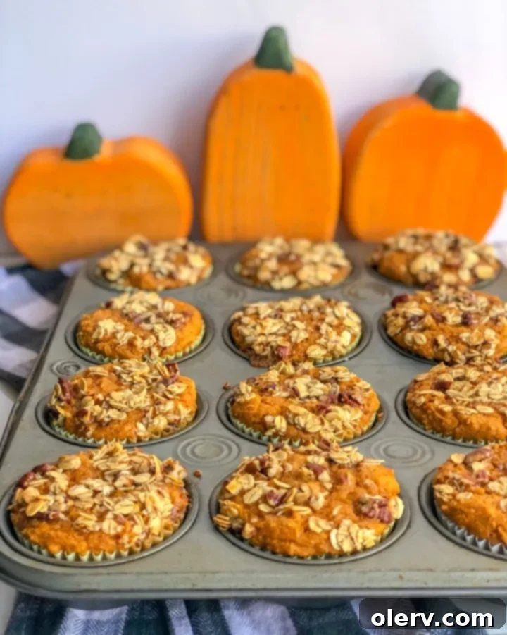 Healthy Pumpkin Muffins topped with maple oat crumble
