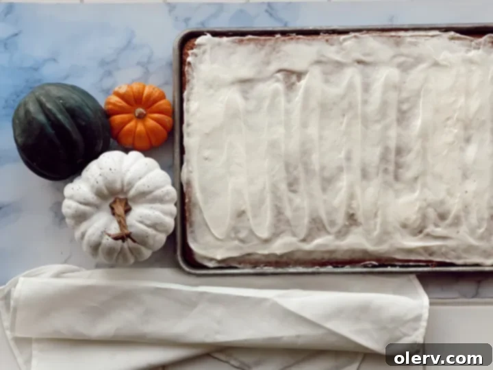 Slice of Pumpkin Spice Cake with cream cheese glaze