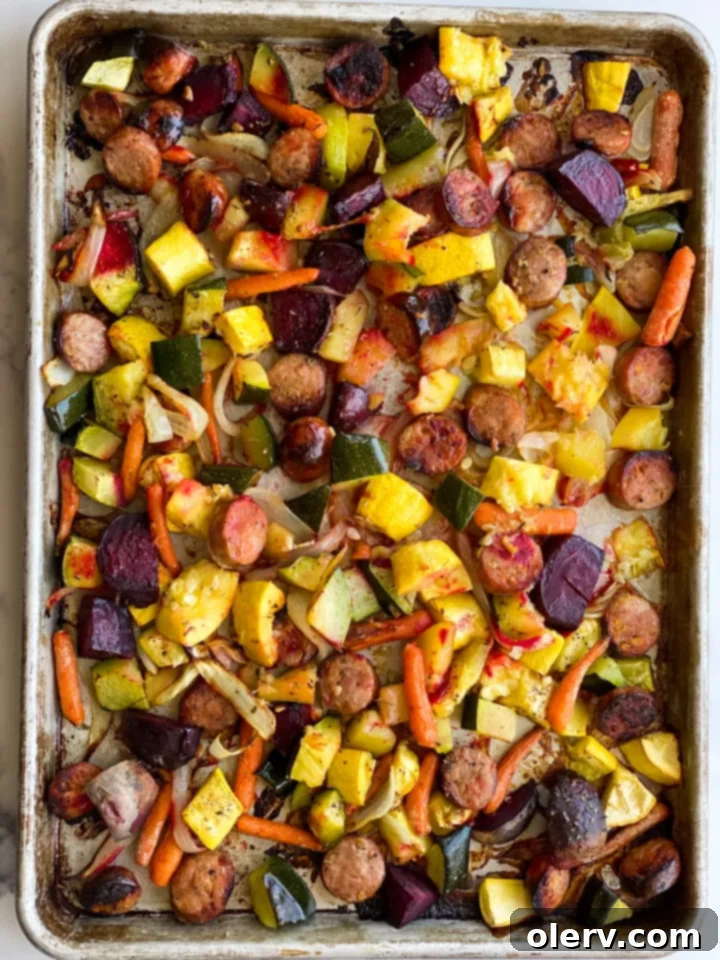 Sheet Pan Sausage and Roasted Veggies 7 Sliced pre-cooked chicken and apple sausage links, ready to be added to the sheet pan with vegetables.