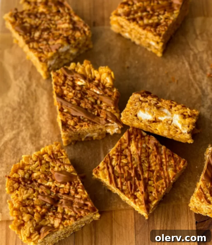 Autumn Pumpkin Crispy Delights 5 Ingredients for pumpkin rice krispie treats laid out, including pumpkin puree and marshmallows