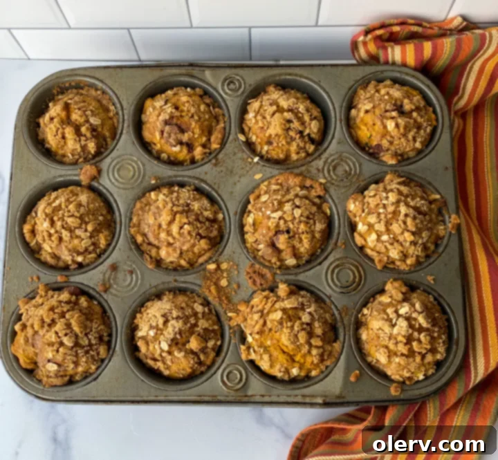 Cozy Autumn Muffins 5 Bowl of homemade streusel topping mixture with oats and cinnamon, ready to be sprinkled on muffins.