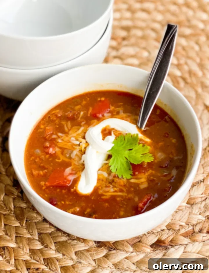 Hearty Pumpkin Chili Recipe 4 A close-up of the pumpkin chili simmering in an Instant Pot, showing its rich texture.