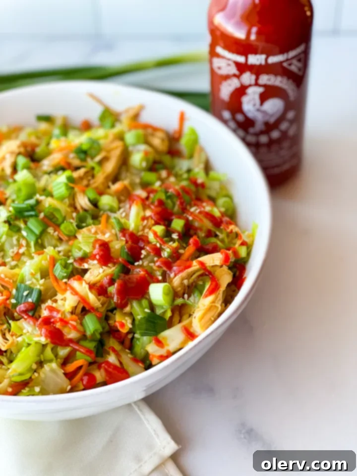 Easy Instant Pot Egg Roll Bowl 4 Ingredients for Instant Pot Egg Roll in a Bowl laid out on a cutting board