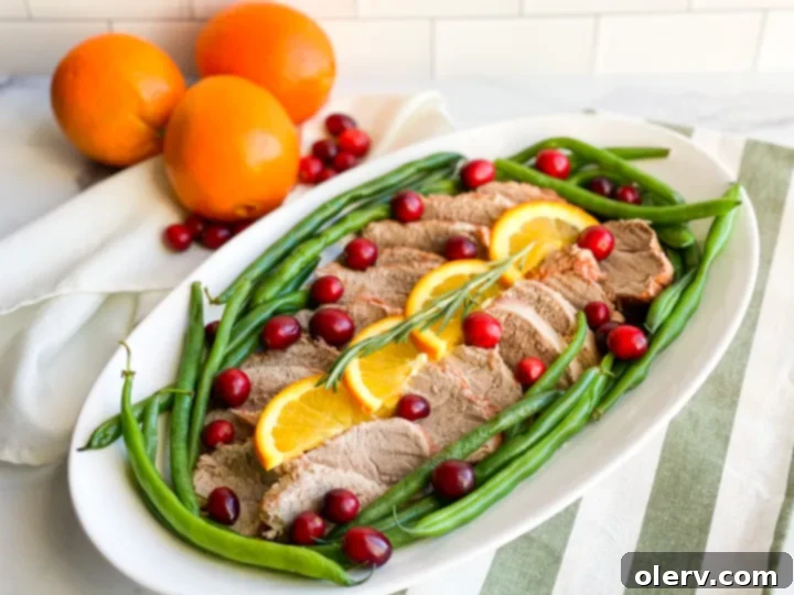 Instant Pot Cranberry Orange Glazed Pork Tenderloin 3 Pork tenderloins being seared in an Instant Pot before pressure cooking.