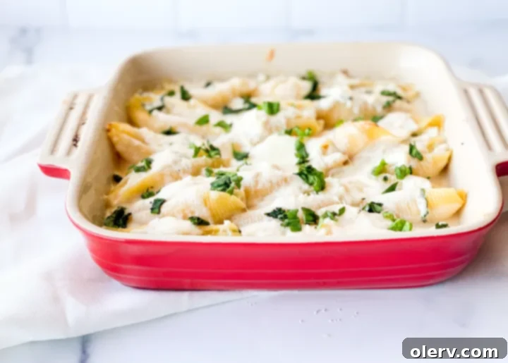 Creamy Ricotta Stuffed Shells 5 Prepared cheese and herb filling in a bowl, ready to be stuffed into pasta shells.