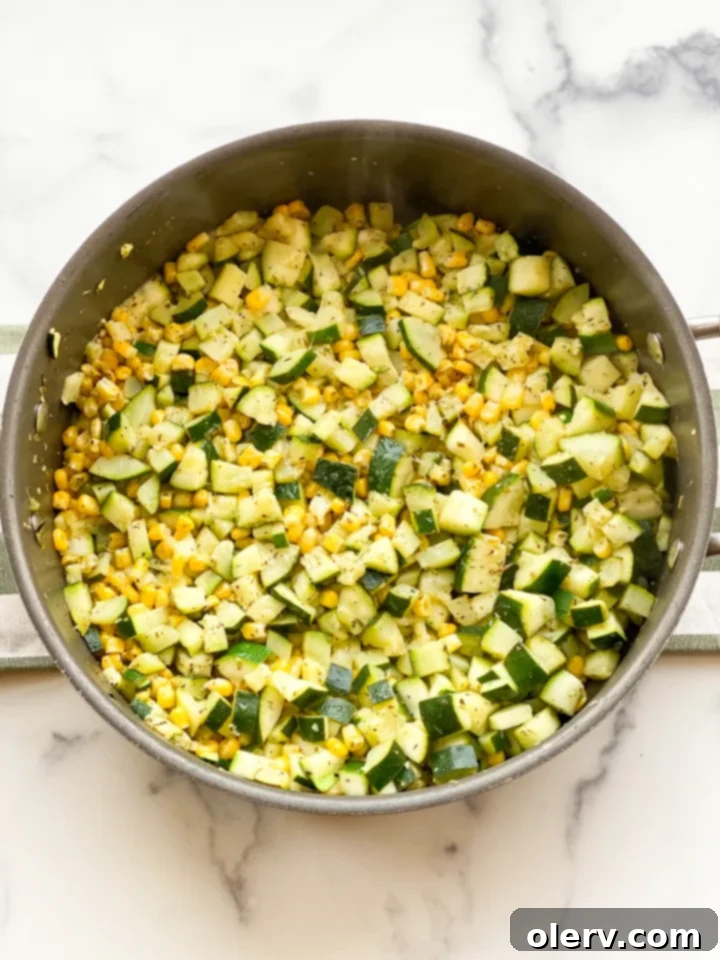 Savory Zucchini Side 4 Diced zucchini and corn kernels ready for cooking