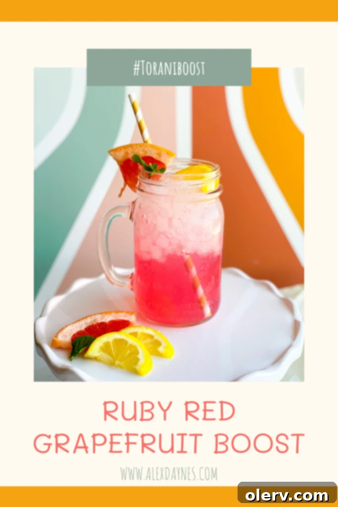 Ruby Red Grapefruit Boost 7 Pinterest graphic for Ruby Red Grapefruit Boost recipe, featuring the vibrant drink and clear recipe title for easy saving.