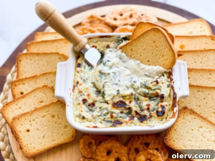 Effortless Oven Baked Spinach Artichoke Dip 5 Spinach and artichoke dip baked to golden perfection, ready for serving