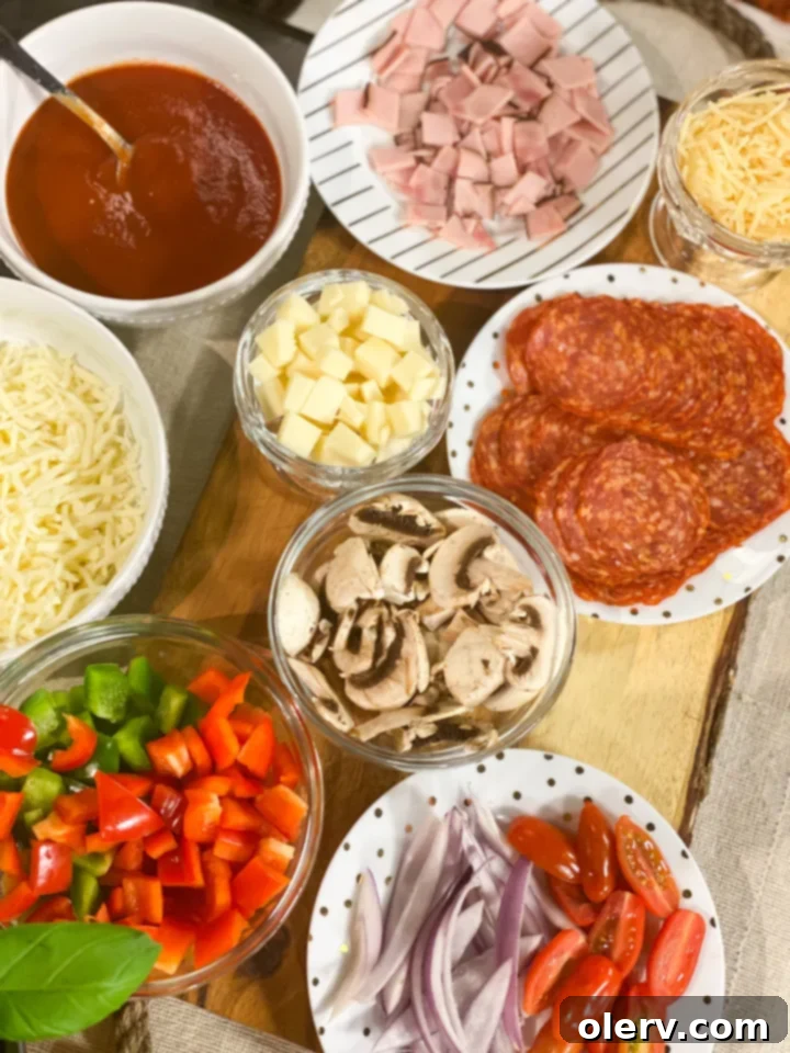 Craft Your Own Pizza Pockets 4 Ingredients laid out for homemade pizza pockets including lavash wraps, cheese, pepperoni, and sauce, demonstrating readiness for assembly.