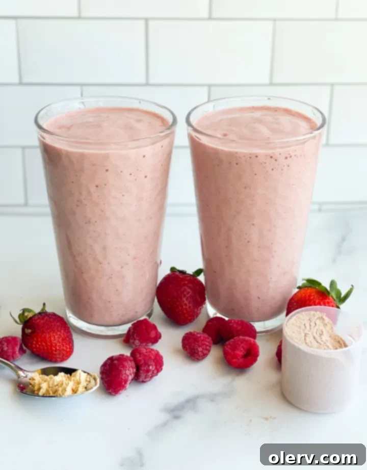 Berry Chocolate Protein Boost 4 A vibrant assortment of fresh raspberries and strawberries, ready to be blended into a healthy protein shake