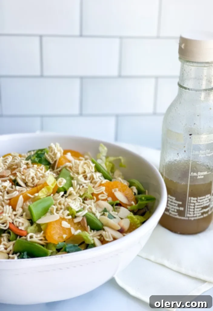 Mandarin Sesame Chicken Salad 4 Ingredients for the homemade Asian Vinaigrette dressing laid out on a counter.