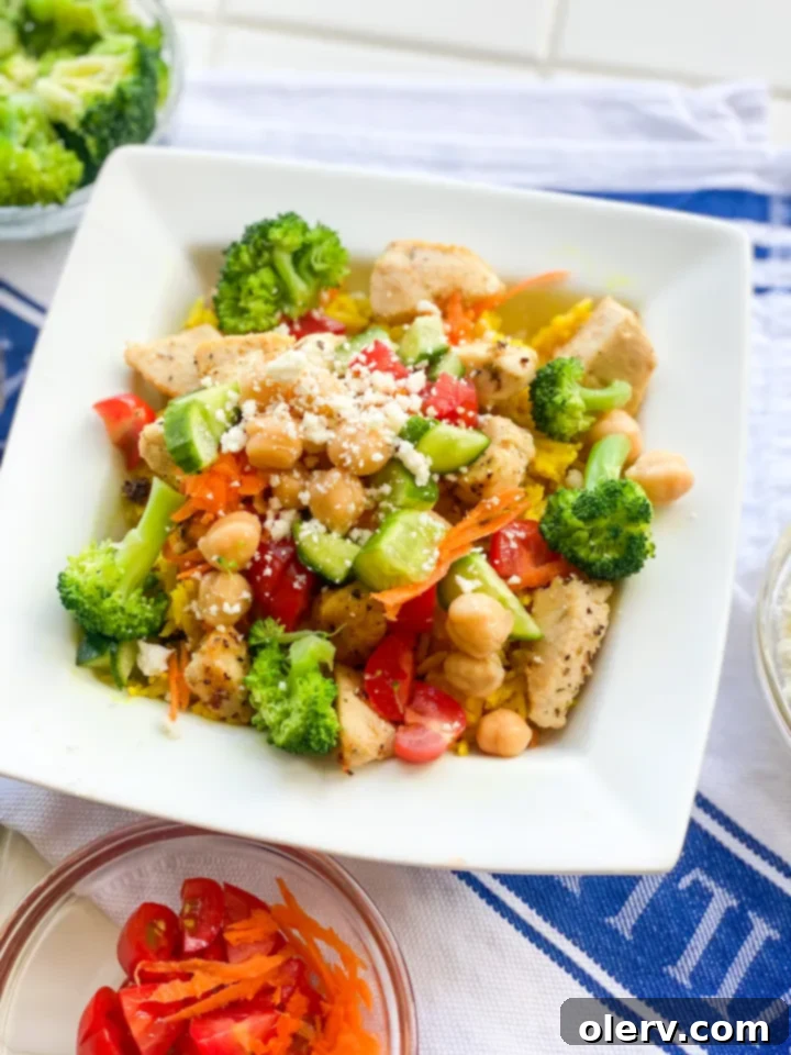 Greek Chicken Bowls 5 Ingredients for Greek chicken marinade laid out on a cutting board.