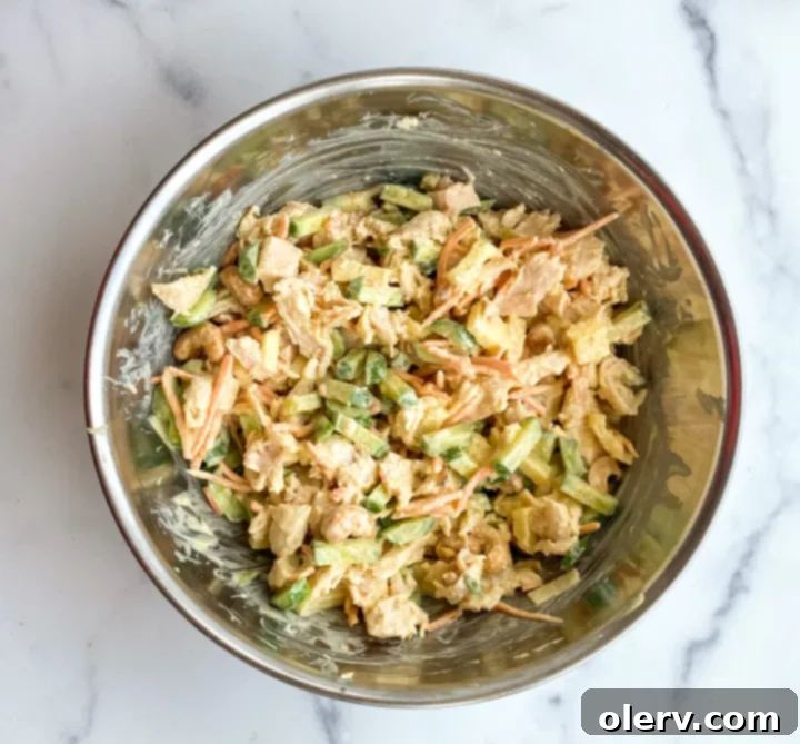 Aromatic Curry Chicken Salad 5 Scoops of curry chicken salad with fresh herbs