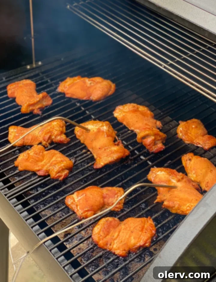 Succulent Smoked Boneless Chicken Thighs 3 Close-up of marinated boneless chicken thighs ready for the smoker