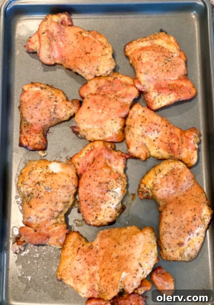Succulent Smoked Boneless Chicken Thighs 7 Perfectly cooked smoked boneless chicken thighs, sliced to show juiciness
