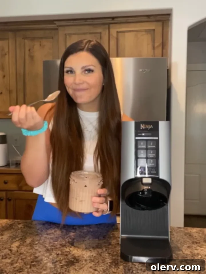 Ninja Creami The Ultimate Frozen Dessert Maker 4 Ninja Creami pint with a mixture ready for freezing