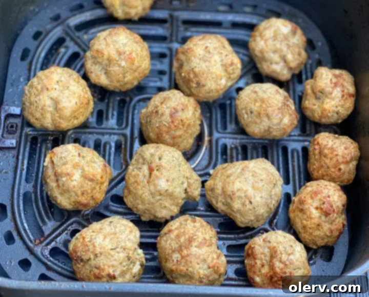 Perfect Air Fryer Turkey Meatballs 3 Ingredients for Air Fryer Turkey Meatballs laid out on a cutting board.