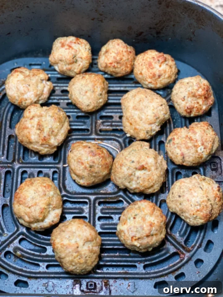 Perfect Air Fryer Turkey Meatballs 6 A plate of freshly cooked Air Fryer Turkey Meatballs, garnished and ready to eat.