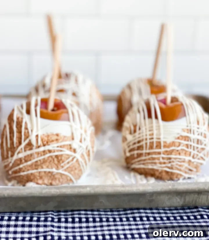 Caramel apple with various toppings