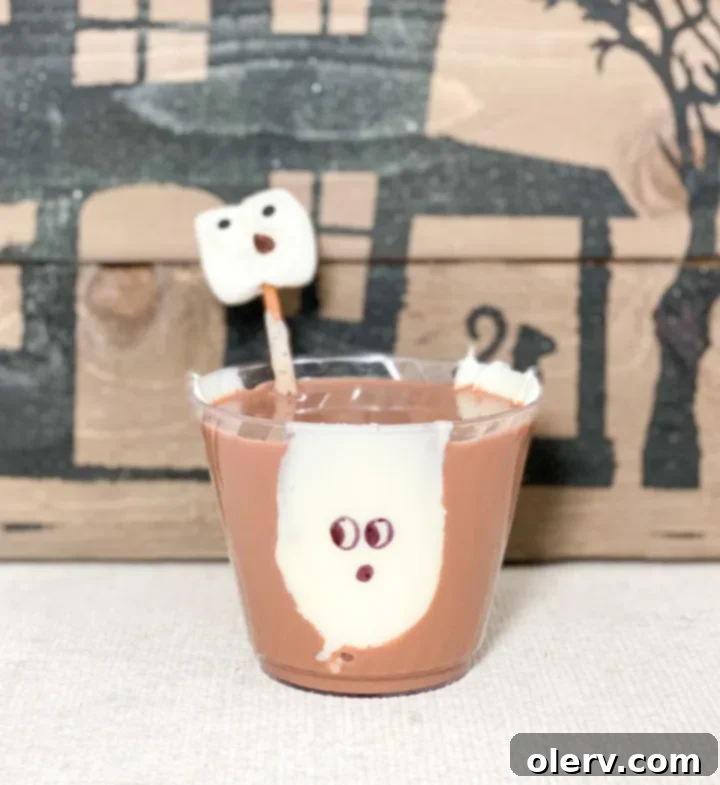 Ghost Glass with chocolate milk and marshmallow ghosts