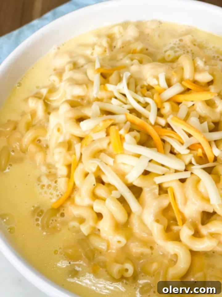 Creamy Instant Pot Mac and Cheese 3 Close-up of perfectly cooked elbow macaroni noodles in the Instant Pot, ready for cheese.