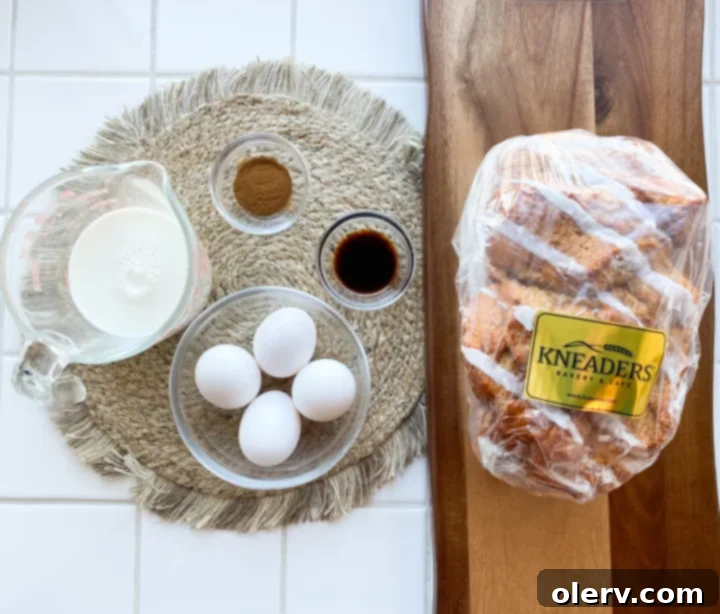 Thick-Cut Cinnamon Bliss French Toast 4 Ingredients for Chunky Cinnamon French Toast laid out: cinnamon swirl bread, eggs, milk, cinnamon, vanilla, and butter