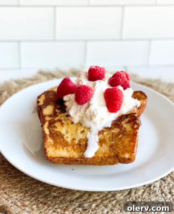 Thick-Cut Cinnamon Bliss French Toast 6 A stack of perfectly cooked Chunky Cinnamon French Toast pieces, ready to be served