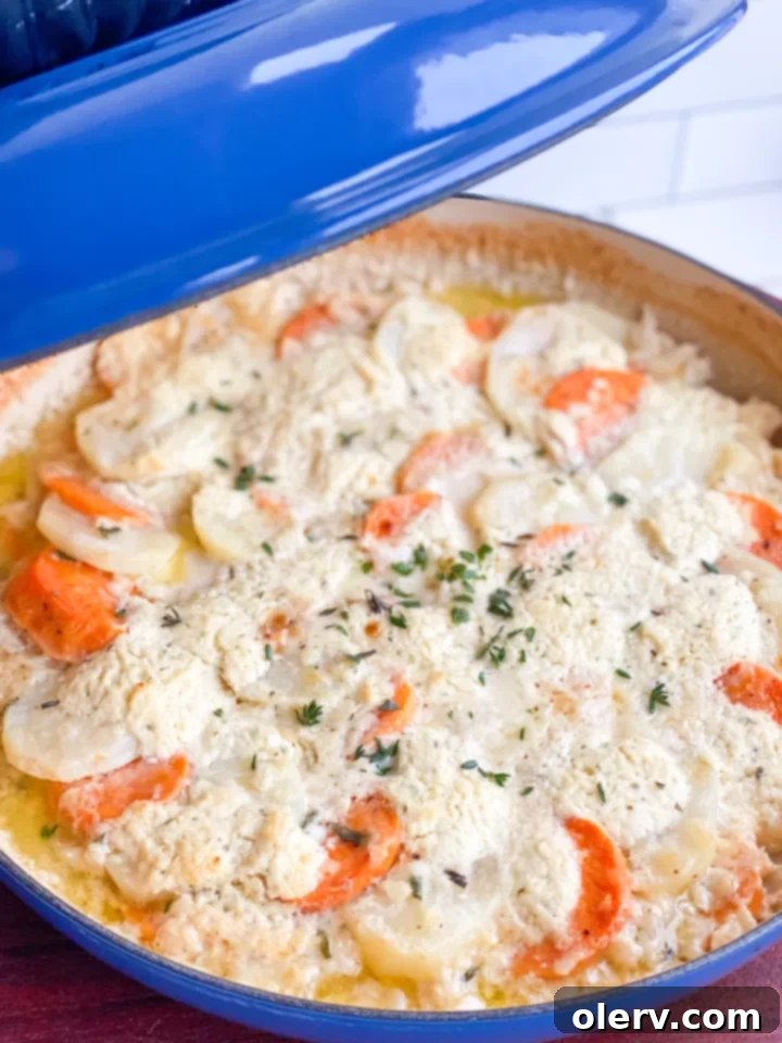 Sweet & Golden Potato Gratin 3 Layered scalloped potatoes in a skillet