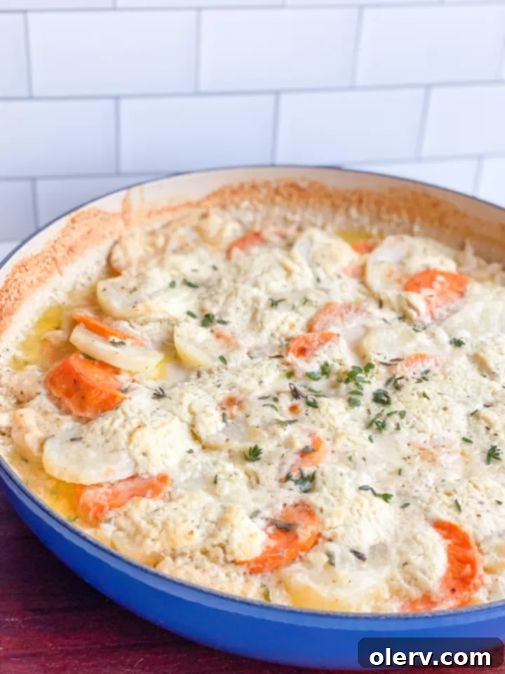 Sweet & Golden Potato Gratin 6 Raw scalloped potato layers in a skillet before baking