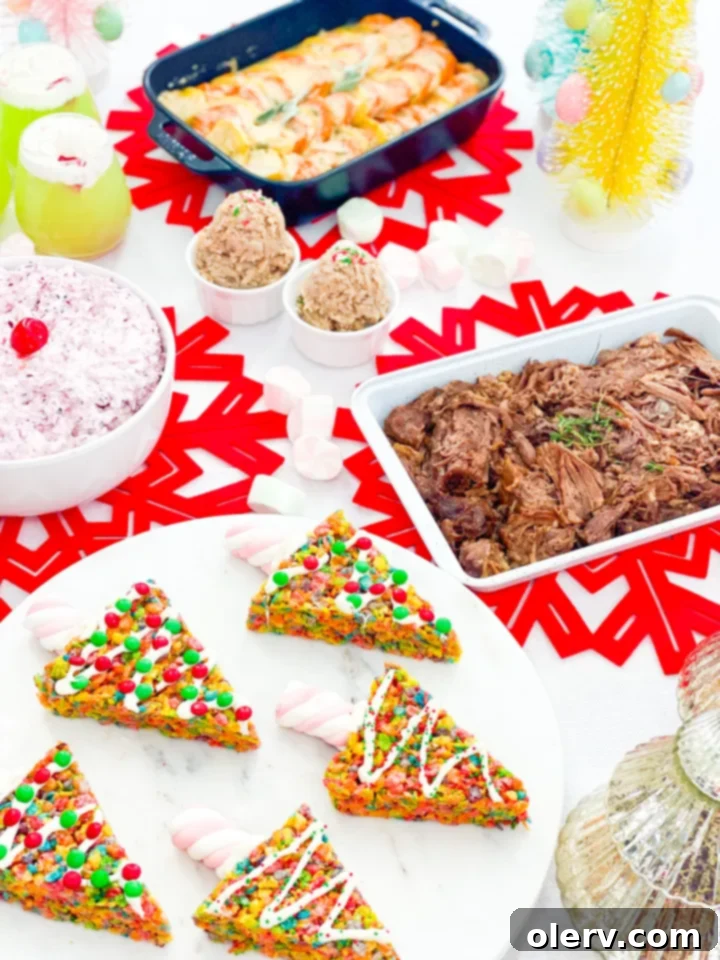 The Grinch's Feast 4 Grinch themed dessert table with festive decor