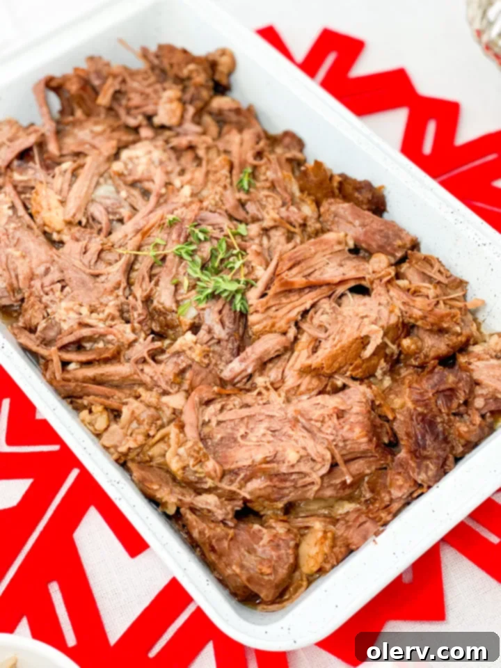 The Grinch's Feast 6 Grinch Roast Beast served on a platter with gravy