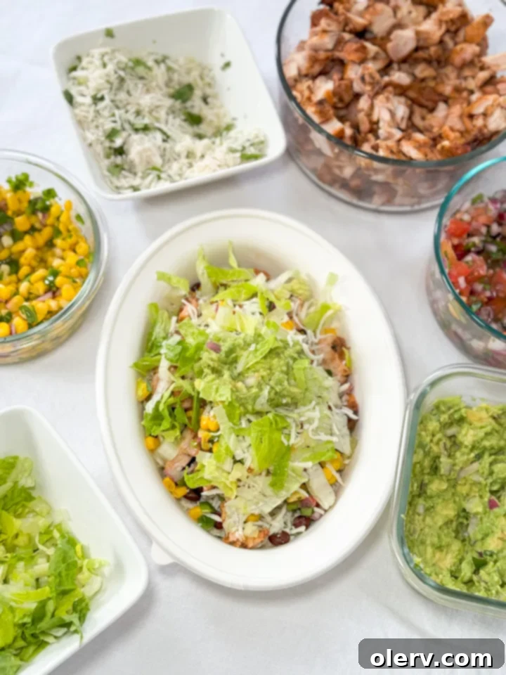 Southwest Chipotle Chicken Bowl 2 Delicious homemade Chipotle Chicken Bowl with rice, chicken, salsa, and guacamole