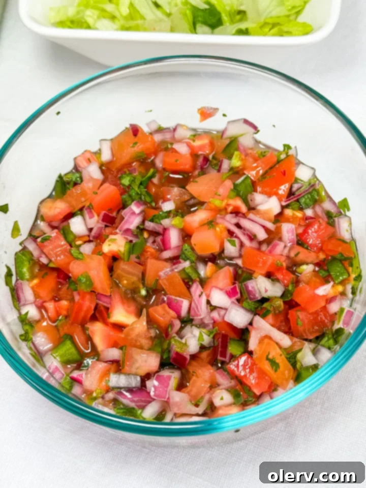 Southwest Chipotle Chicken Bowl 7 A vibrant selection of fresh salsa and guacamole ingredients