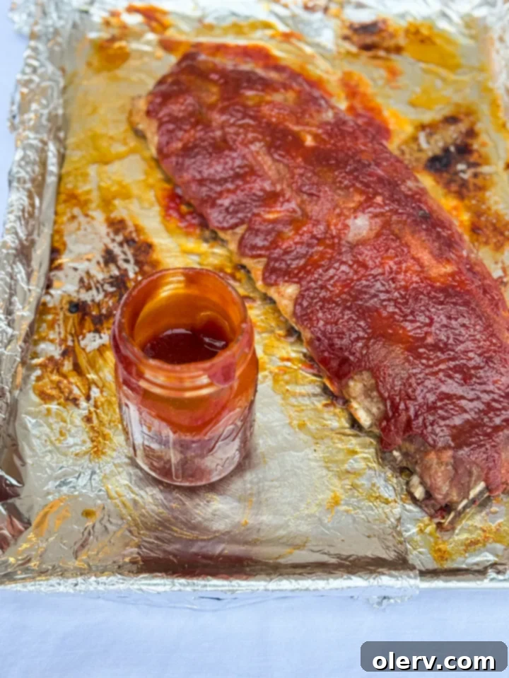 Fall-Off-The-Bone Oven Ribs 4 Rack of pork ribs seasoned with dry rub before baking