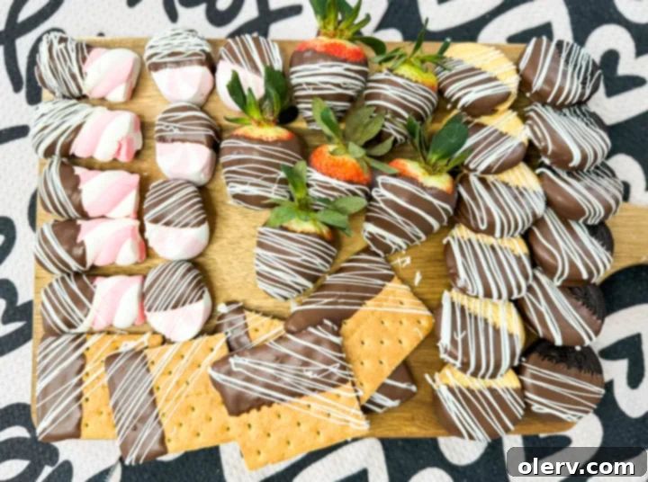 Decadent Chocolate Charcuterie 7 A bowl of creamy chocolate chip dip surrounded by graham crackers for dipping