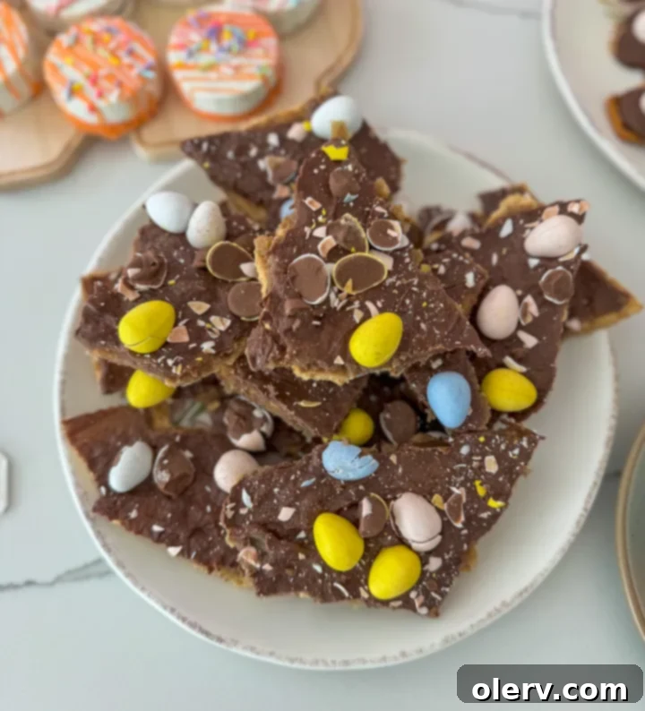 Unlocking the Cadbury Egg 5 Cadbury Egg Crack in various broken pieces, showcasing the crunchy texture and colorful toppings