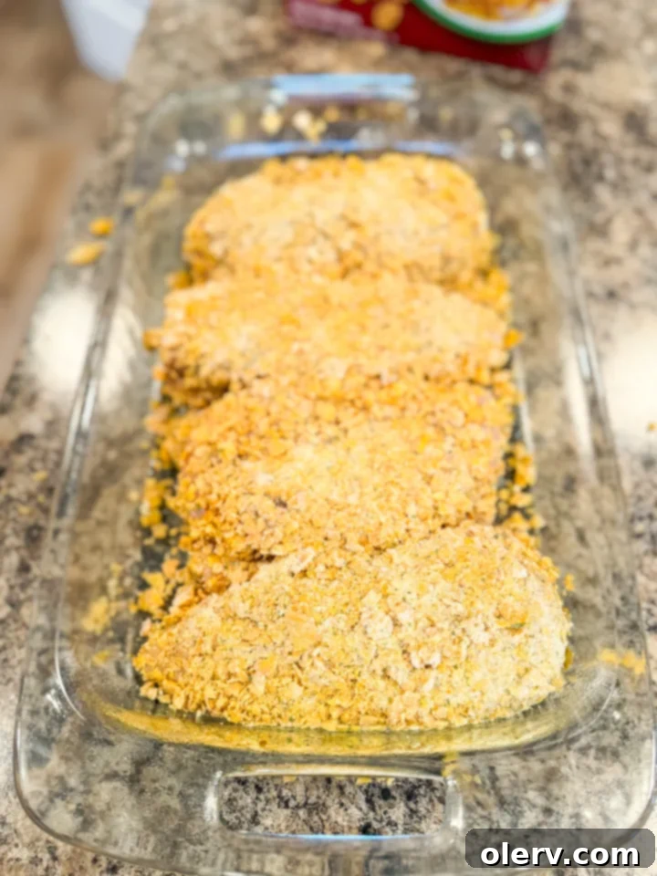 Golden Crispy Ranch Chicken 4 Crushed cornflakes and ranch seasoning mixed in a bowl, ready for breading