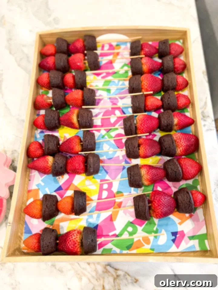 Berry Sweet One 7 Strawberry brownie kabobs displayed beautifully for the Berry First Birthday party.