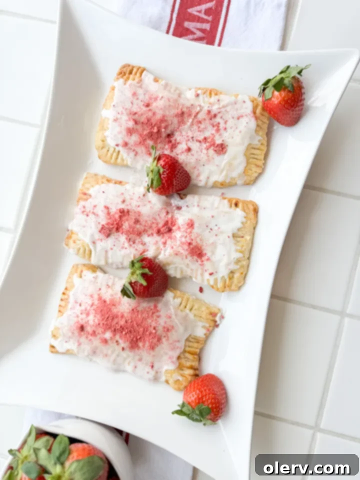 Homemade Strawberry Poptarts on a baking sheet