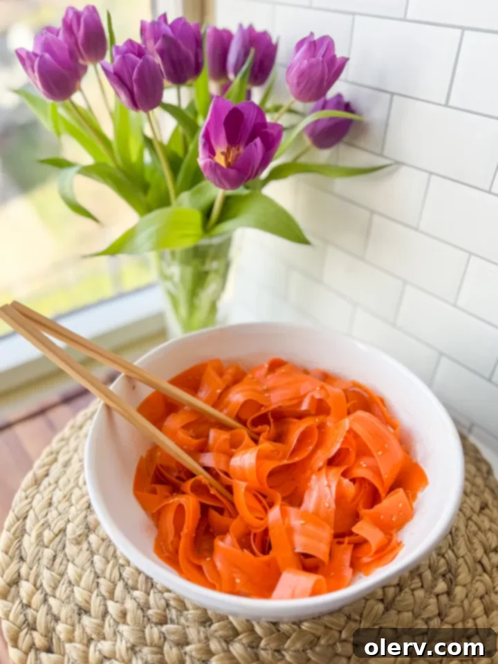 Fresh Carrot Slaw 5 Tossing Raw Carrot Salad with Ginger Dressing