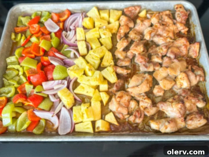Aloha Chicken 4 Cooked Sheet Pan Hawaiian Chicken with pineapple and vegetables.