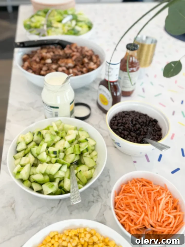 Smoky BBQ Chicken Chopped Salad 5 A serving platter loaded with various BBQ Chicken Chopped Salad ingredients, highlighting the vibrant colors.