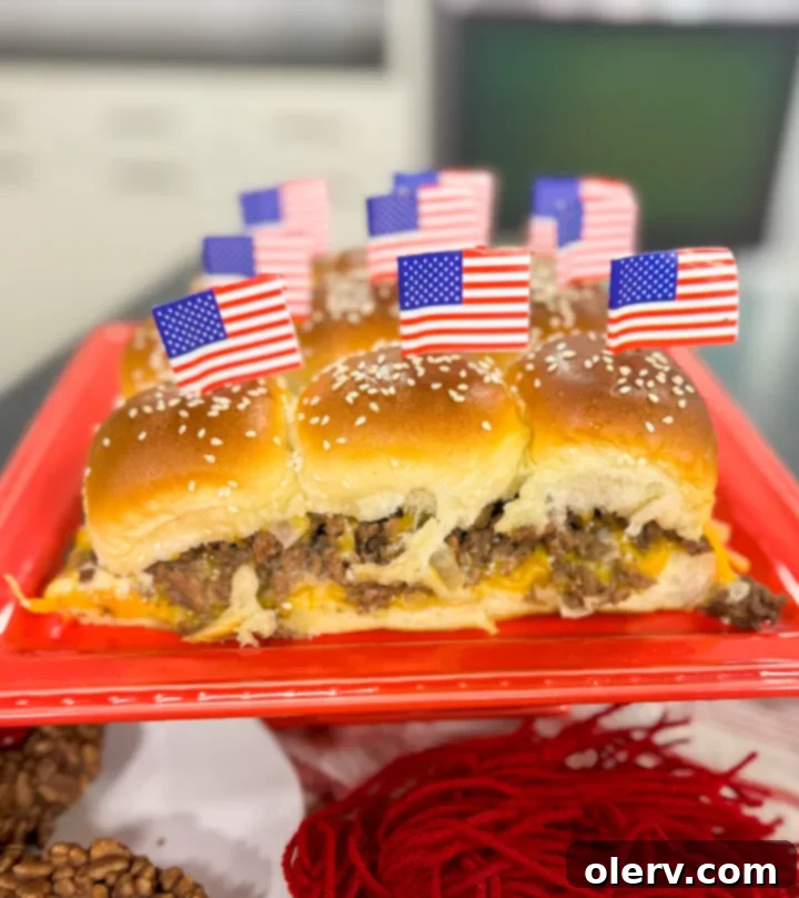 Homestyle Mini Cheeseburgers 5 Close-up of baked All-American Cheeseburger Sliders, showing melted cheese and toasted buns.