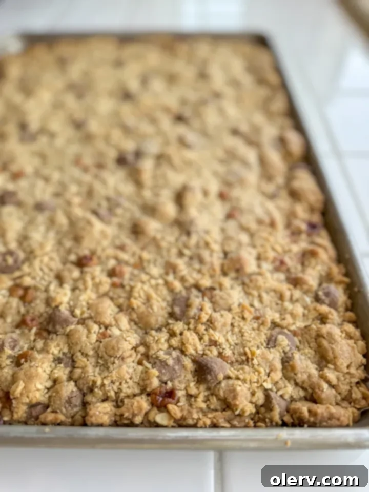 Gooey Caramel Chocolate Chip Cookie Bars 4 Ingredients for making Caramel Chocolate Chip Bar Cookies laid out on a kitchen counter.